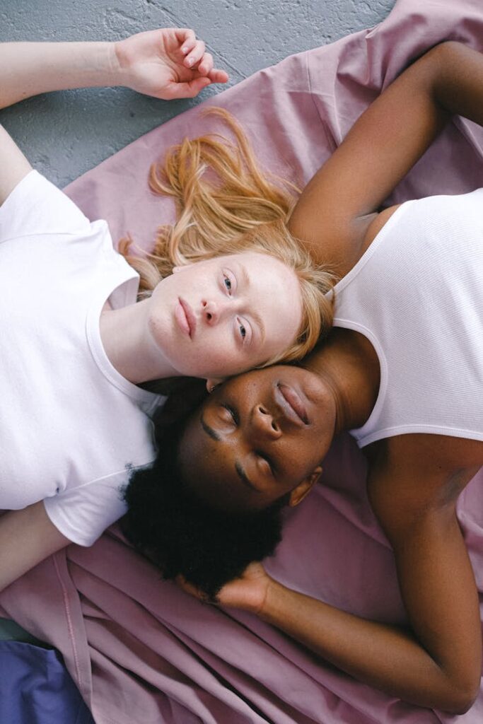 Two Women Lying Together on the Floor